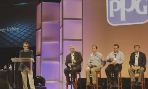 Moderator Bob Medved of PPG (left) leads a panel discussion with representatives of Audi, Toyota, Mazda and Collision Diagnostic Services.