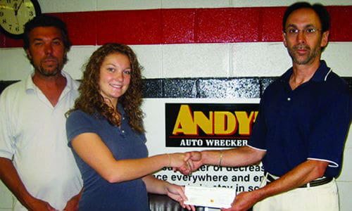 Rob Heslop from Andy&rsquo;s Auto Wreckers with his daughter Lindsay, receiving her OARA scholarship cheque from Steve Fletcher of OARA. Heslop&rsquo;s daughter Lauren received an OARA Scholarship this year, being the fourth of his children to do so.