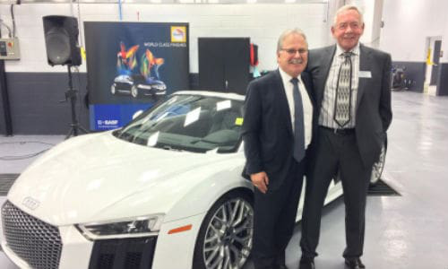 Bill Harbottle, President of Jim Pattison Auto Group, and Bill Hatswell, President/Owner of Distinctive Auto Works and the Craftsman Group. The new DAW location in Edmonton is the 40th facility in the Craftsman Group.