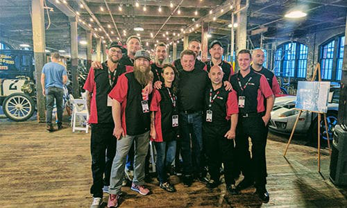 Painters from around the world with Chip Foose. From left to Right: Christian Wilke, Danny Schramm, Clay Hoberecht, Carl-Andr&eacute; Giroux, Connie Manjavinos, Chip Foose, Shane Wanjon, Jacob Miles, Carmine De Maria, Justin Jimmo and Pablo Prado.