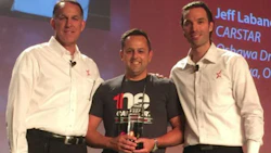 Jeff Labanovich (centre) receives the award for CARSTAR Franchisee of the Year at the 1NE CARSTAR Conference. The award was presented by Dean Fisher, Chief Operations Officer (left) and Michael Macaluso, President of CARSTAR.