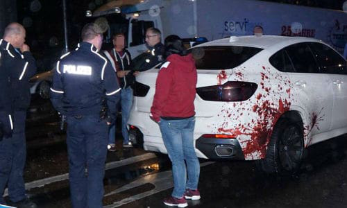 Don't worry, it's not real. The blood spatter is just a decal. It turned out to be realistic enough to fool police, though, who understandbly pulled the car over.