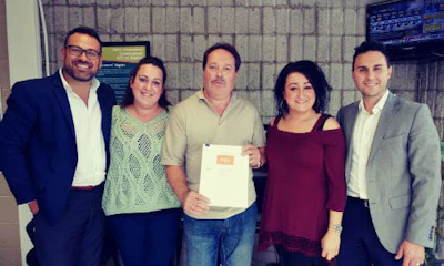 Paul Prochilo, CEO of Simplicity Car Care; LillyAnn, Mario and Christina Ramos of Simplicity Brampton; Domenic Ieraci, President of Simplicity Car Care.