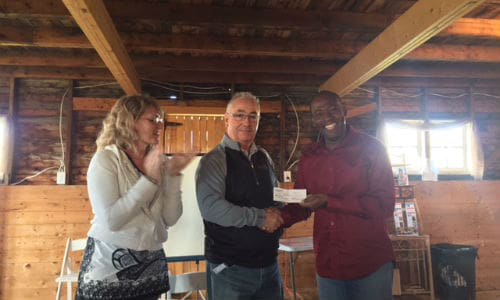 Lisa and Marc Honorat, founders of Haiti Arise, with Tom Bissonnette (centre). The organization has announced that construction of the teaching facility dedicated to collision repair will begin in January 2018.