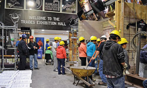 The NSCSC Trades Exhibition Hall follows a kind of “speed dating” formula, as attendees move from booth to booth over the course of several hours, testing out a number of careers in the trade.