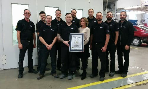 The team at Carrossier ProColor Saint-Hyacinthe receives their I-Car Gold Class certification.