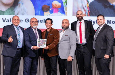 Ontario store owners celebrate their notable donations to the CARSTAR CF cause.