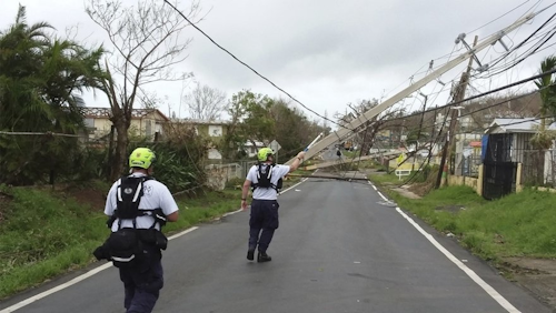Workers restoring power in Puerto Rico. / Image: FiercePharma