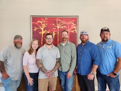 (Left to Right) Jon Mosebach, Carrie Gulajan, Austin Reiner, Mike Mulsow, Tanner Myers, and Joel Hall. Not pictured: Jason McElrath.