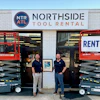 Three families coming back together. Josh Nickell (at right) and Cooper Douville (at left) celebrating the acquisition in their Buckhead branch, holding a picture of the Northside Tool Rental founder Roy Milling. Fun fact: Cooper and Josh's dad were coworkers and mentored by Roy.