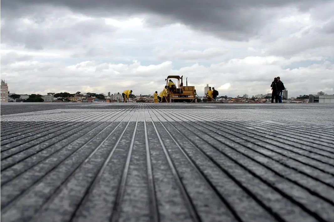 Grooves on a runway increase friction and reduce the risk of hydroplaning.