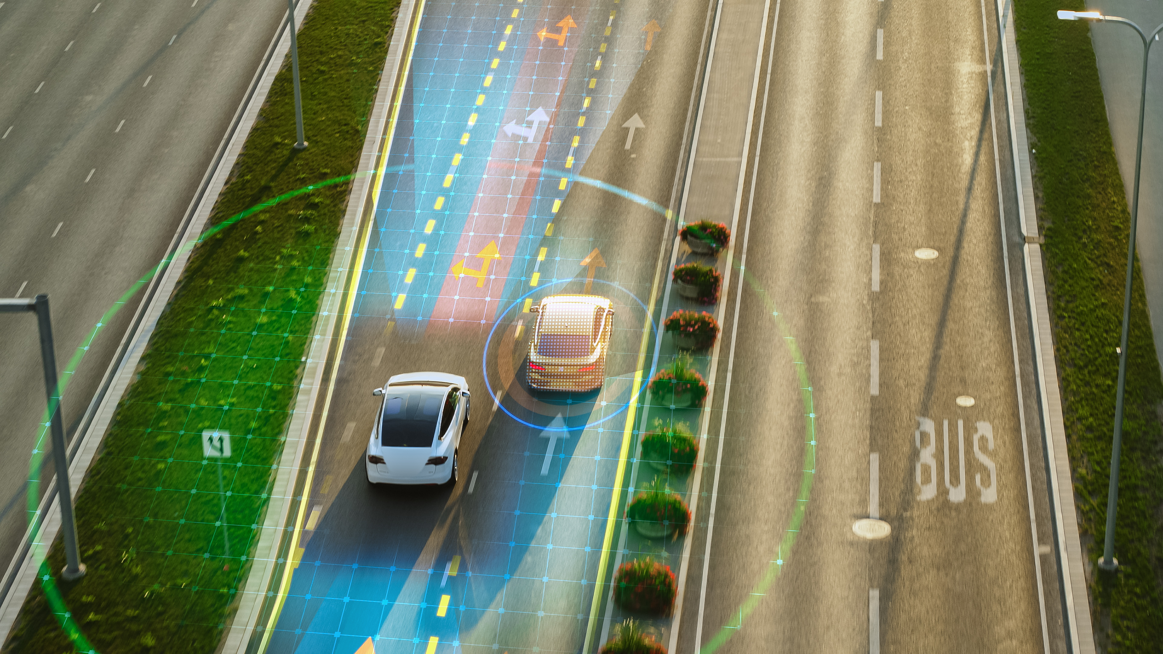 Autonomous vehicles with digital sensor visualization on multi-lane highway.