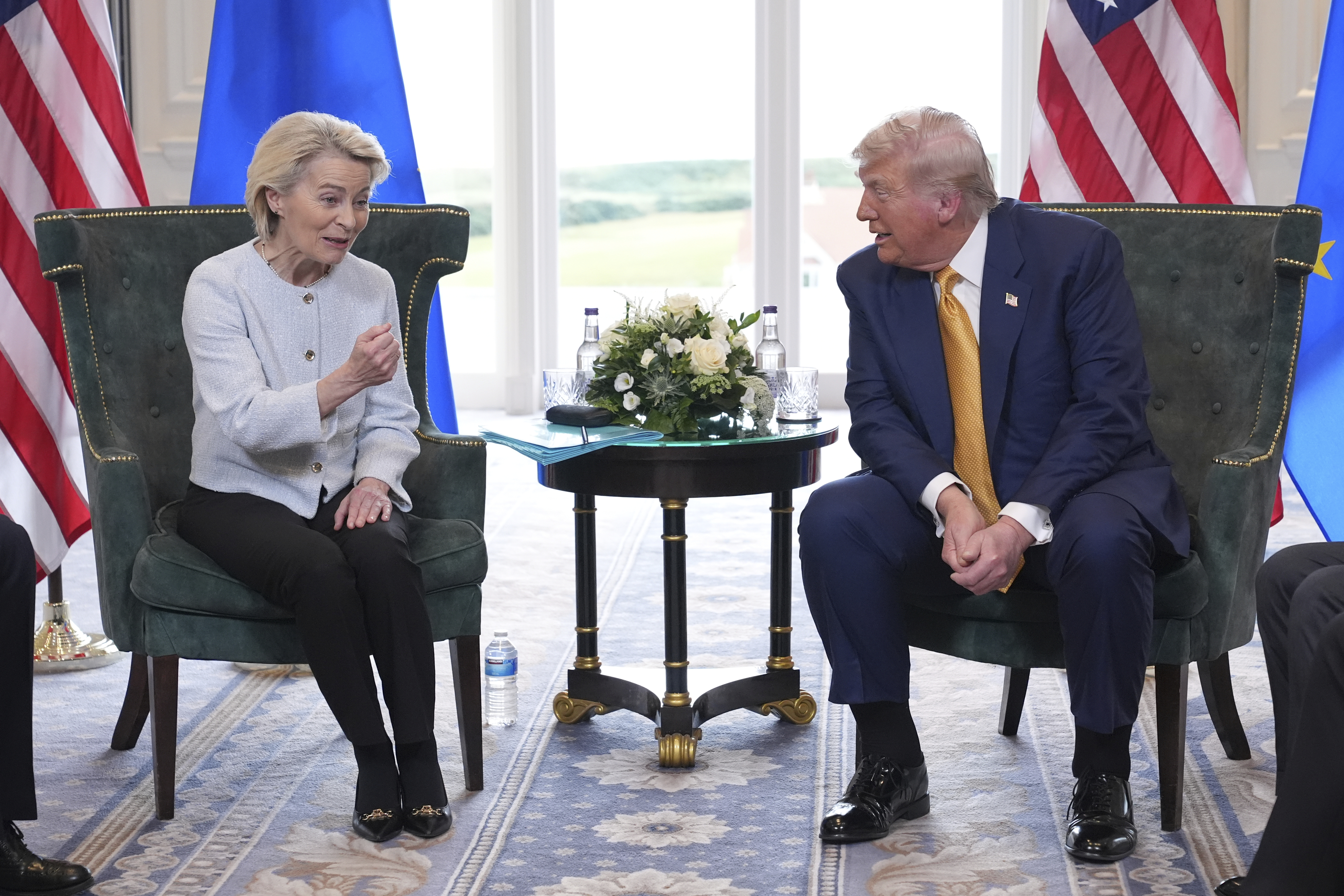 President Donald Trump and European Commission President Ursula von der Leyen speak as they meet at the Trump Turnberry golf course in Turnberry, Scotland Sunday, July 27, 2025.