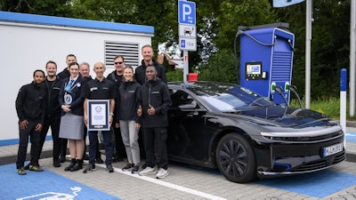 The Lucid Air Grand Touring and Lucid Team.