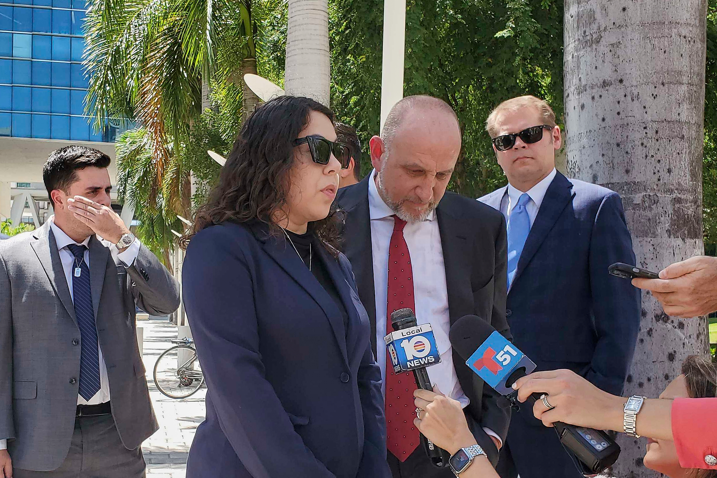 Neima Benavides, whose sister died in a Florida crash involving Tesla&rsquo;s Autopilot driver assist technology, speaks to reporters outside the federal courthouse in Miami, Friday, Aug. 1, 2025.