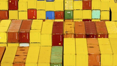 Cargo containers at a shipping terminal at the Port of Oakland, Aug. 6, 2025, Oakland, Calif.