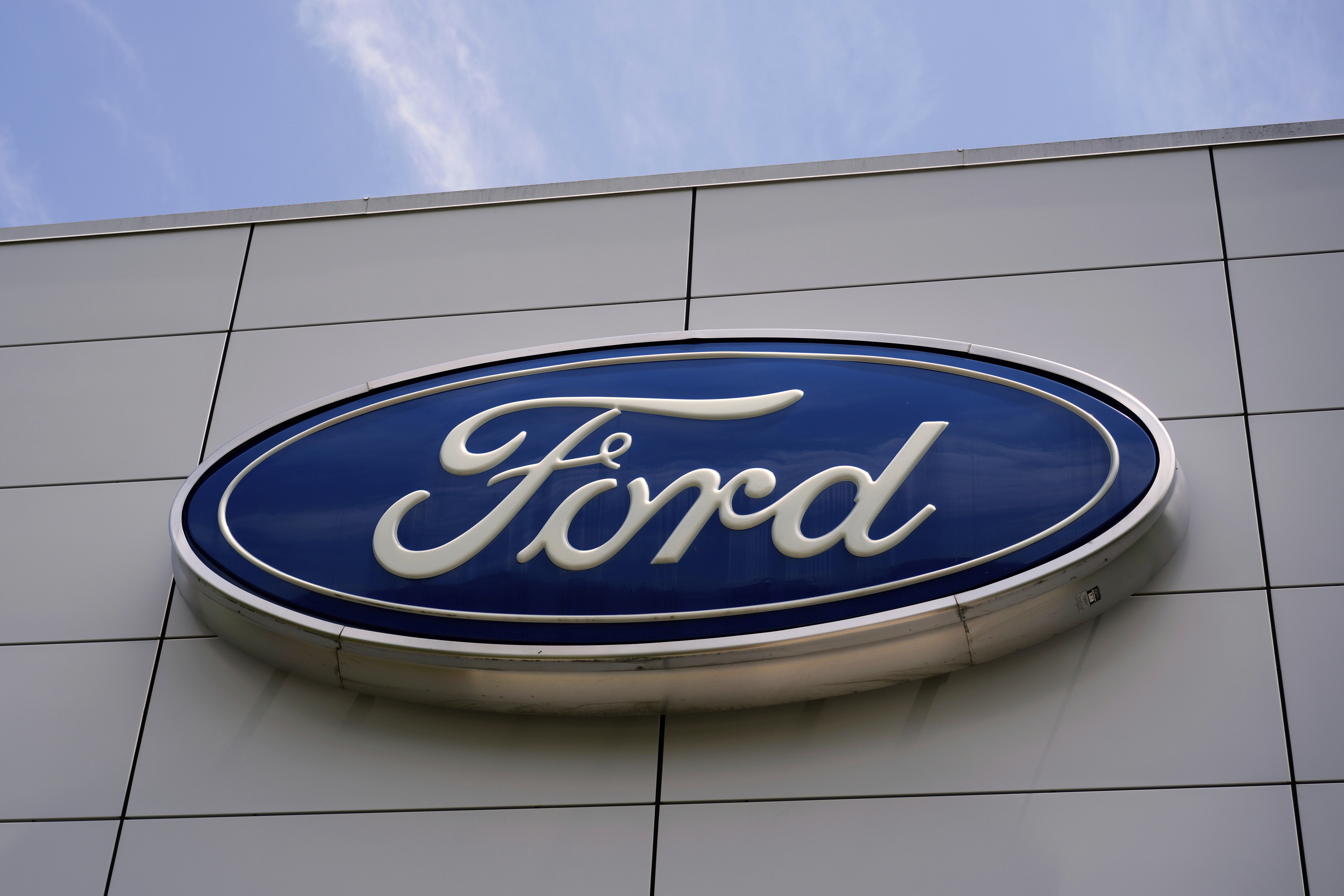 The Ford logo is seen above the entrance to the Ford Motor Company Kentucky Truck Plant, April 30, 2025, in Louisville, Ky.