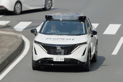 In this image made from video provided by Nissan Motor Co., Japanese automaker Nissan's test vehicle featuring an automated driving system packed with artificial intelligence moves on a road in Tokyo on September, 2025.