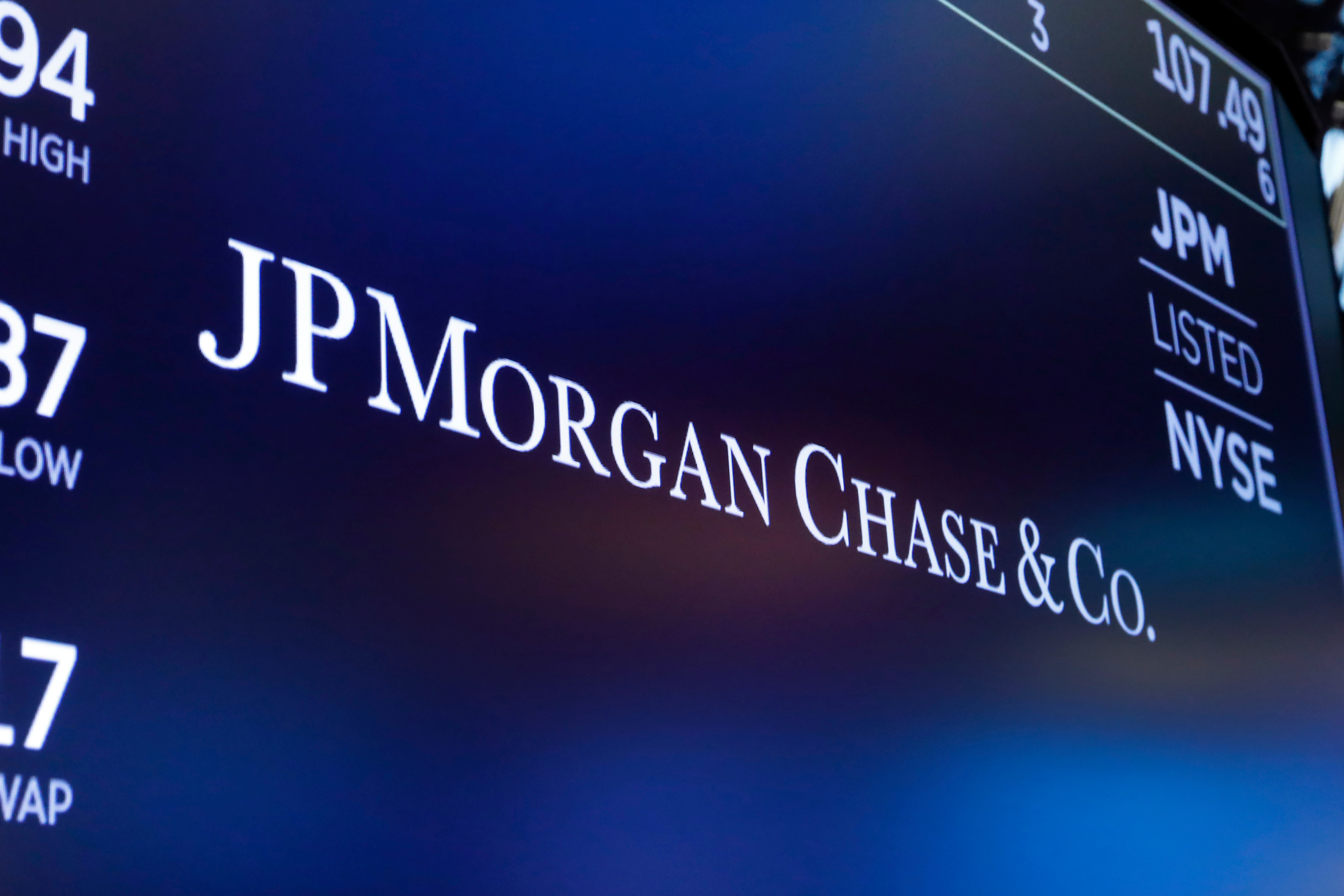 The logo for JPMorgan Chase & Co. appears above a trading post on the floor of the New York Stock Exchange in New York, Aug. 16, 2019.