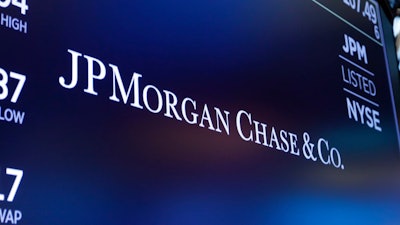 The logo for JPMorgan Chase & Co. appears above a trading post on the floor of the New York Stock Exchange in New York, Aug. 16, 2019.
