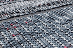 New cars for export wait for shipment at a port in Shanghai, China on May 11, 2025.