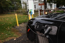 Daphne Dixon's electric vehicle is plugged into a Level 2 EV charger Saturday, Oct. 11, 2025, in Norwalk, Conn.