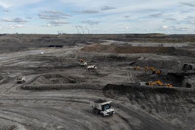 Autonomous mining truck operate the Huaneng Yimin open-pit coal mine in Hulunbuir in northern China's Inner Mongolia province China, Monday, Sept. 15, 2025.