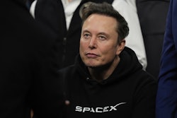 Elon Musk attends the finals for the NCAA wrestling championship, Saturday, March 22, 2025, in Philadelphia.