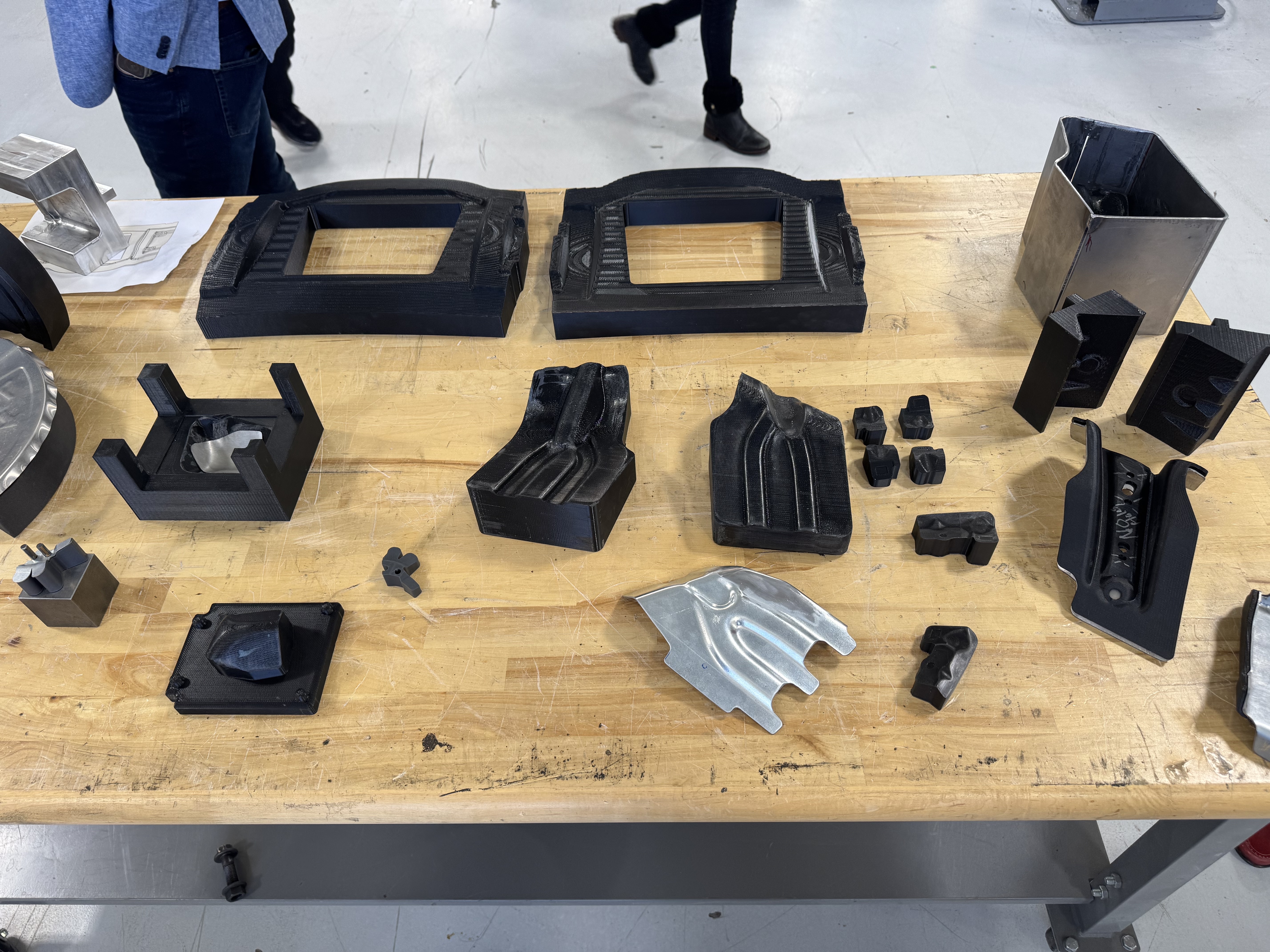 Various 3D-printed parts used by Rivian.
