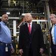 President Donald Trump listens to Corey Williams, Ford River Rouge Plant Manager, left, and Bill Ford, Executive Chairman of Ford, during a tour of the Ford River Rogue complex, Tuesday, Jan. 13, 2026, in Dearborn, Mich.