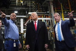 President Donald Trump listens to Corey Williams, Ford River Rouge Plant Manager, left, and Bill Ford, Executive Chairman of Ford, during a tour of the Ford River Rogue complex, Tuesday, Jan. 13, 2026, in Dearborn, Mich.