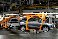 Vehicles move along the 2023 Chevrolet Bolt EV and EUV assembly line at the General Motors Orion Assembly June 15, 2023, in Lake Orion, Mich.