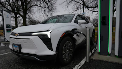 An electric vehicle charges at a station Wednesday, March 11, 2026, in Lincolnwood, Ill.