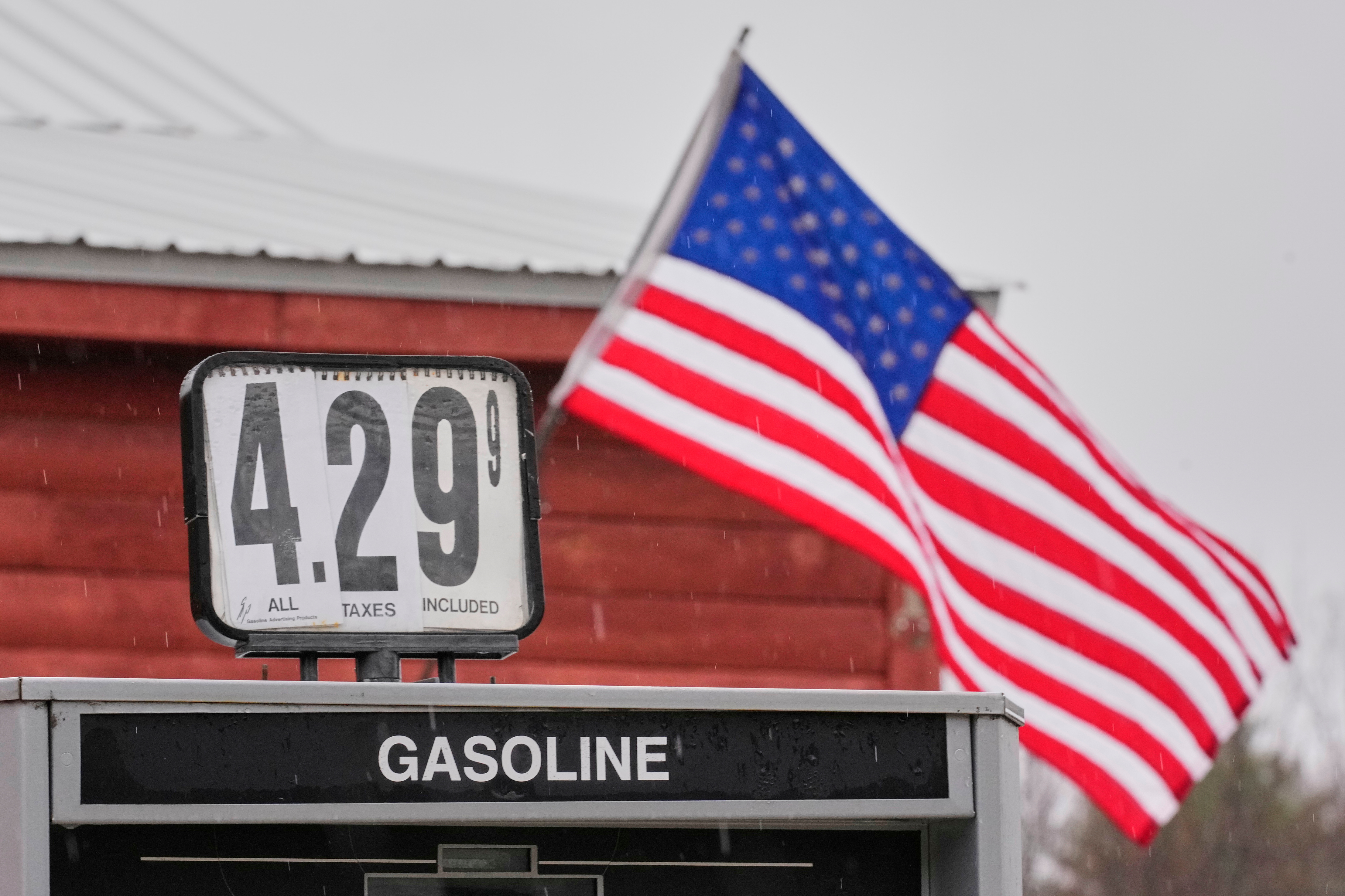 A sign shows the price of gas at a store, Tuesday, March 31, 2026, in Freeport, Maine.