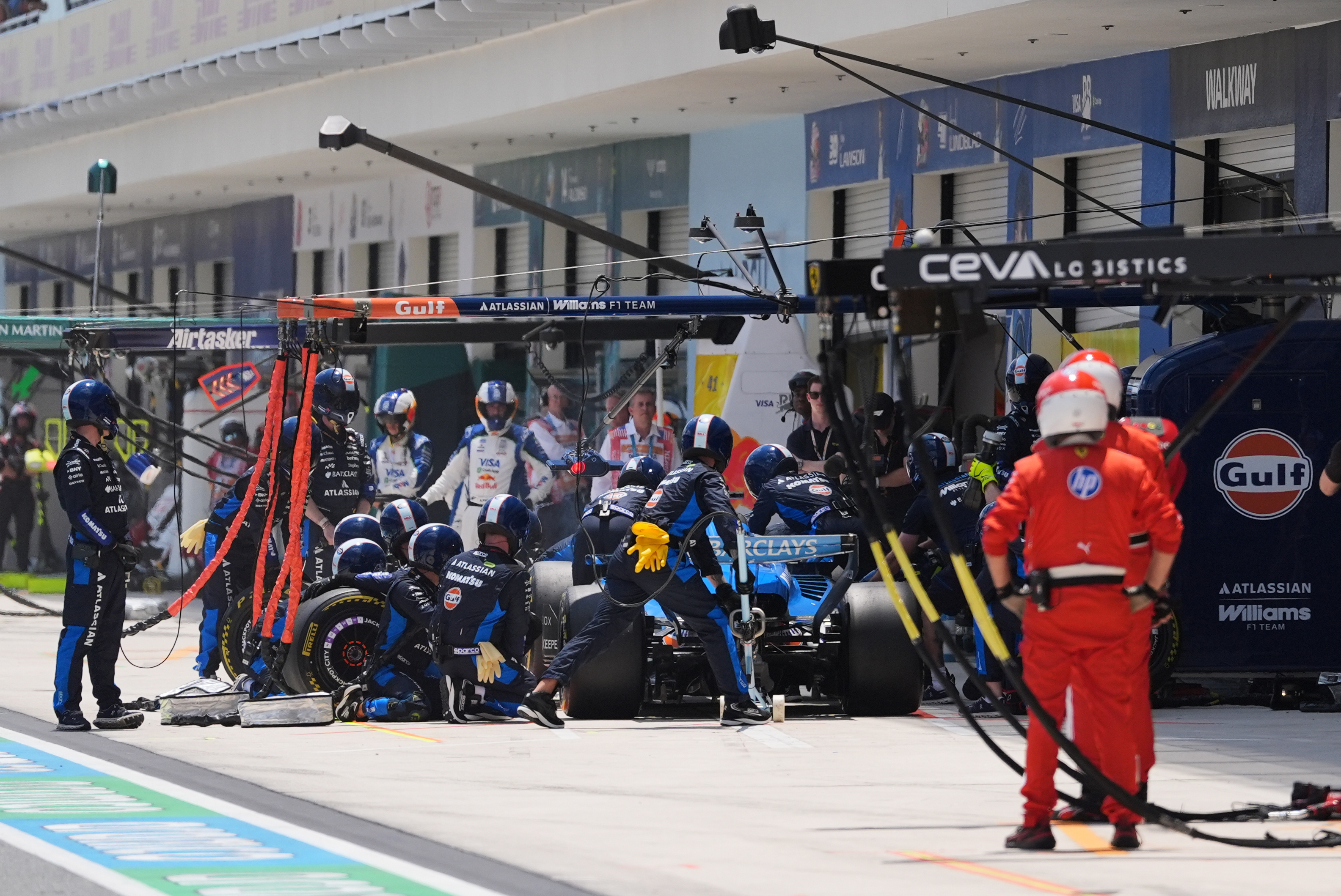 Williams driver Alexander Albon of Thailand makes a pit stop during a sprint auto race at the Miami Formula One Grand Prix, Saturday, May 2, 2026, in Miami Gardens, Fla.