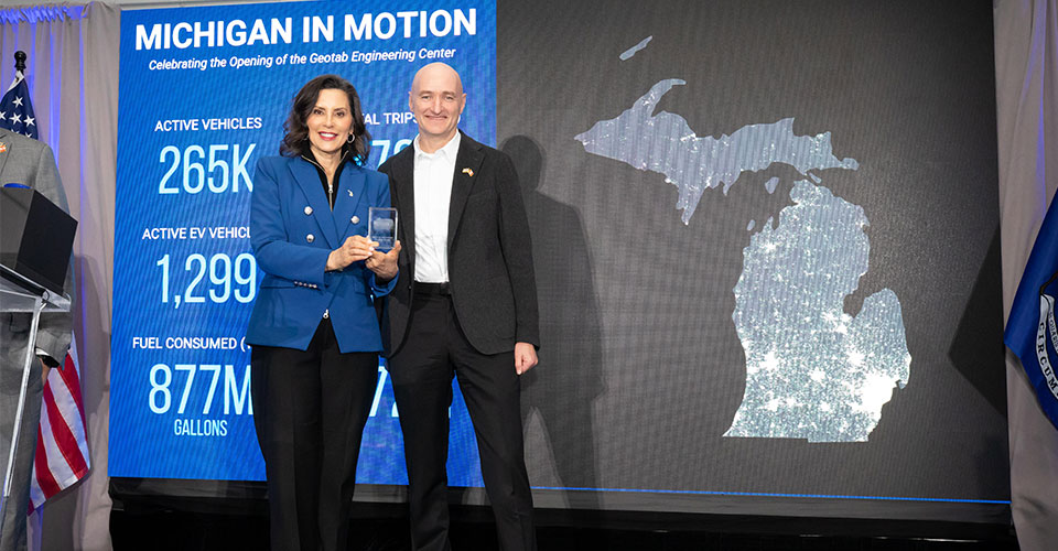 The opening of Geotab's Engineering Center in Madison Heights was celebrated alongside Michigan Governor Gretchen Whitmer (left) and Neil Cawse, founder and CEO of Geotab.