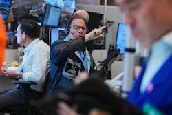 Optons trader Anthony Spina, center, works on the floor of the New York Stock Exchange, Monday, June 15, 2026.