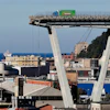 A vehicle sits short of a section of the Morandi highway bridge that collapsed on Aug. 15, 2018, in Genoa, northern Italy.