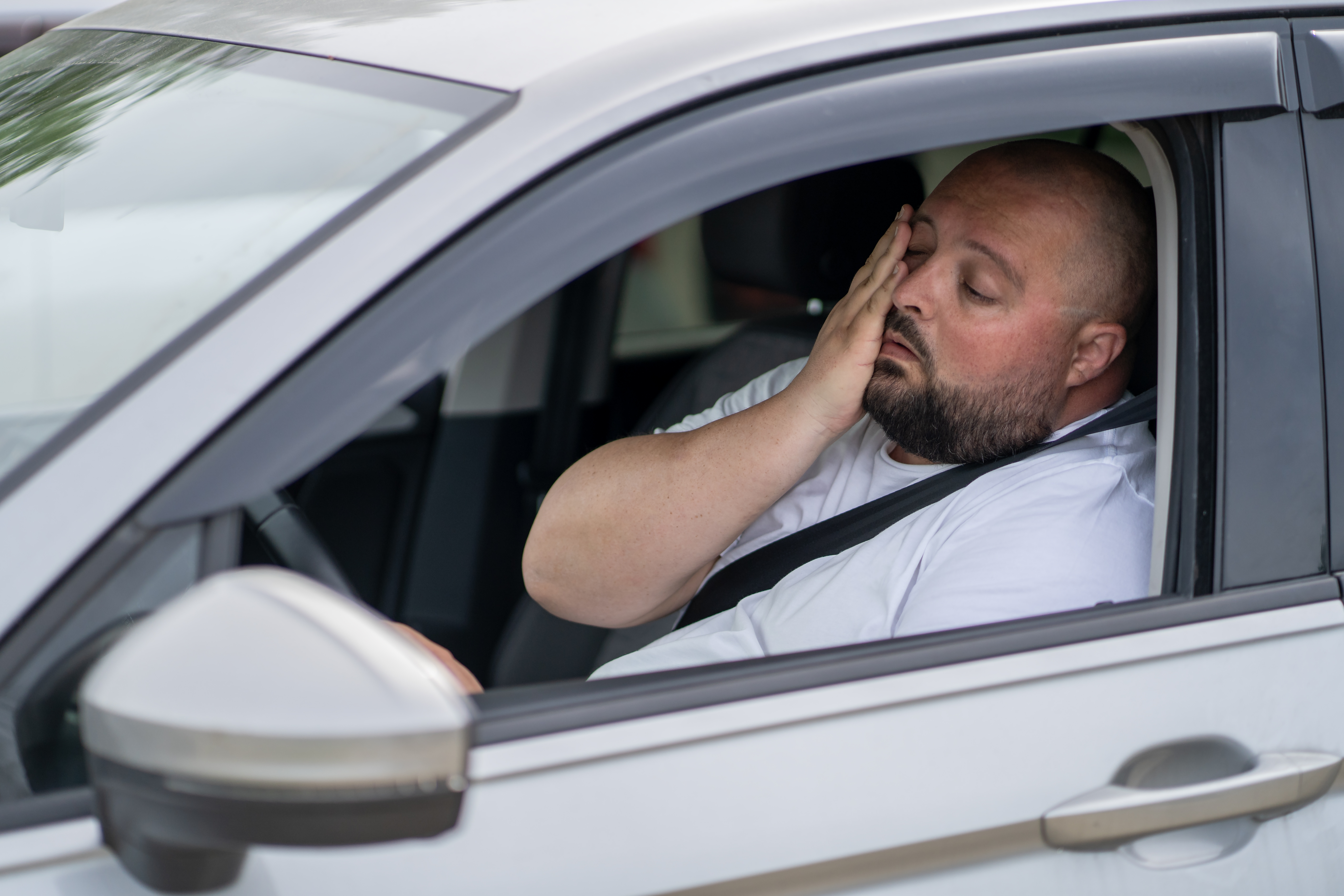 Tired Overweight Man Drives Car With Broken Air Co 2025 03 08 08 23 21 Utc