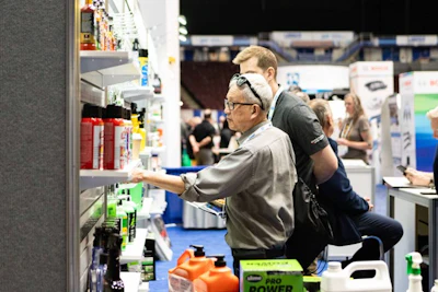 Customer Visiting A Vendor Booth